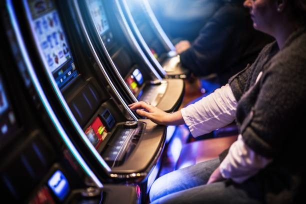 maxi88 platform interface showing live casino tables, sportsbook, and slot games on mobile